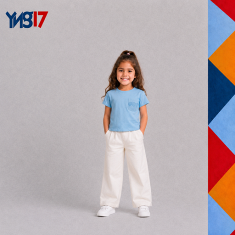 Light blue girls' t-shirt designed with a soft texture and simple daily look, paired with loose white bottoms.